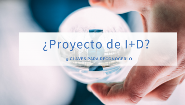 Persona interactuando con pantalla digital con el texto "¿Proyecto de I+D+i?", representando innovación y tecnología empresarial.